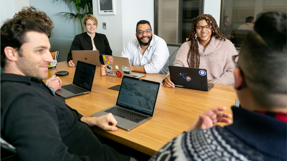 Accounting and finance staffing agency team evaluating salary benchmarks and market trends